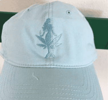 Tonal single-color mermaid design embroidered on a light blue dad hat