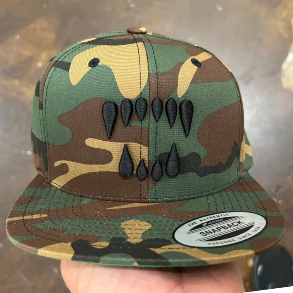 woodland camo Yupoong 6089M flat bill snapback hat with black 3D puff embroidered fangs