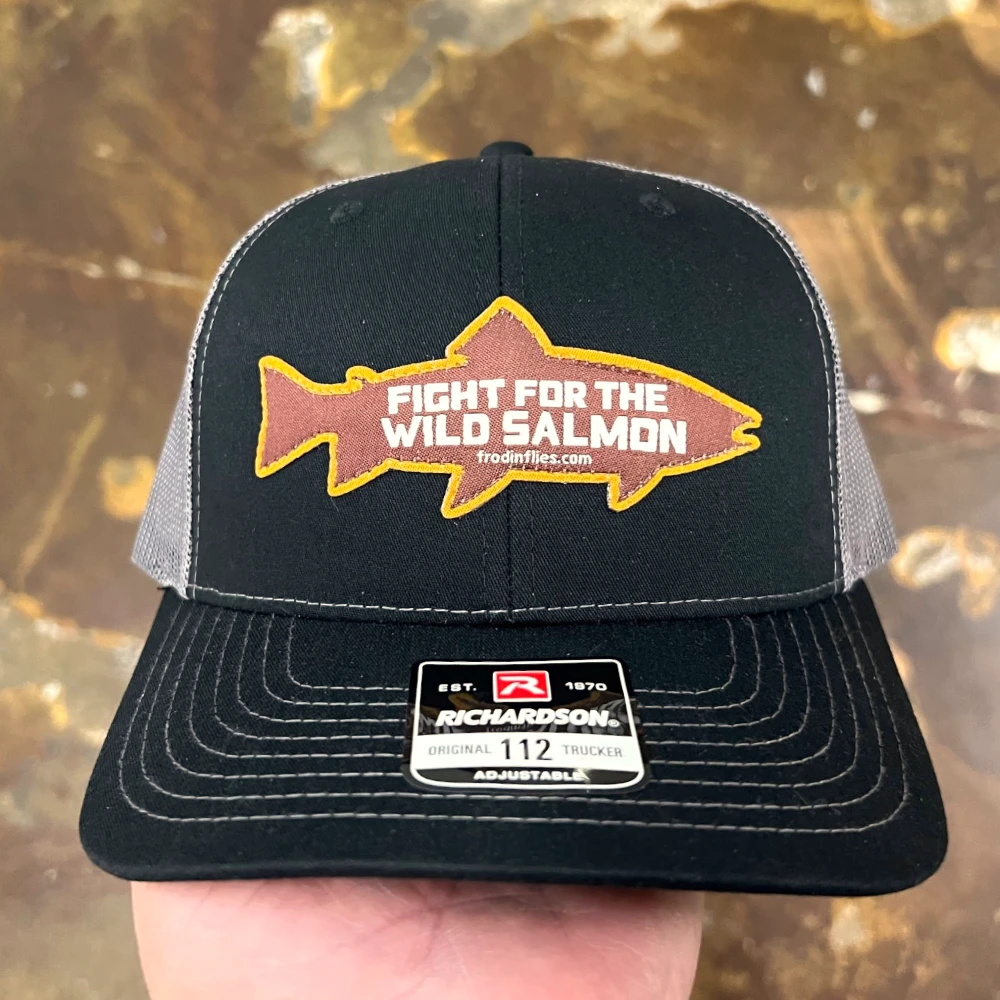 Black Richardson 112 trucker hat with custom shaped fish patch