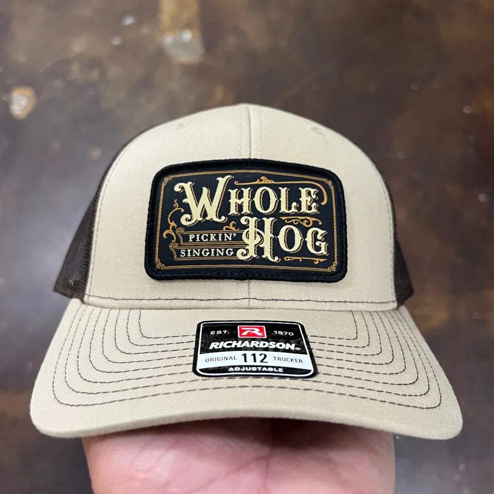 Khaki Richardson 112 trucker hat with black and gold woven patch