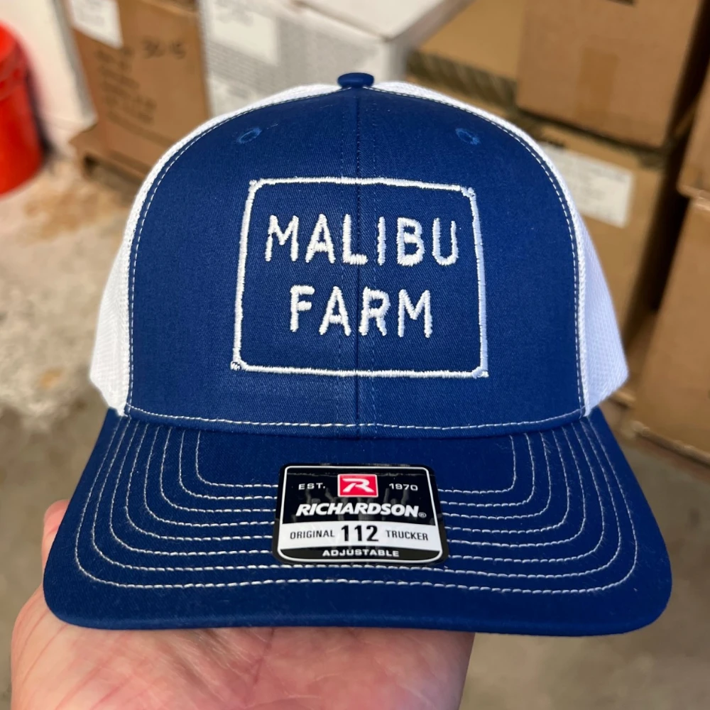 Navy and white Richardson 112 trucker hat with white embroidered logo