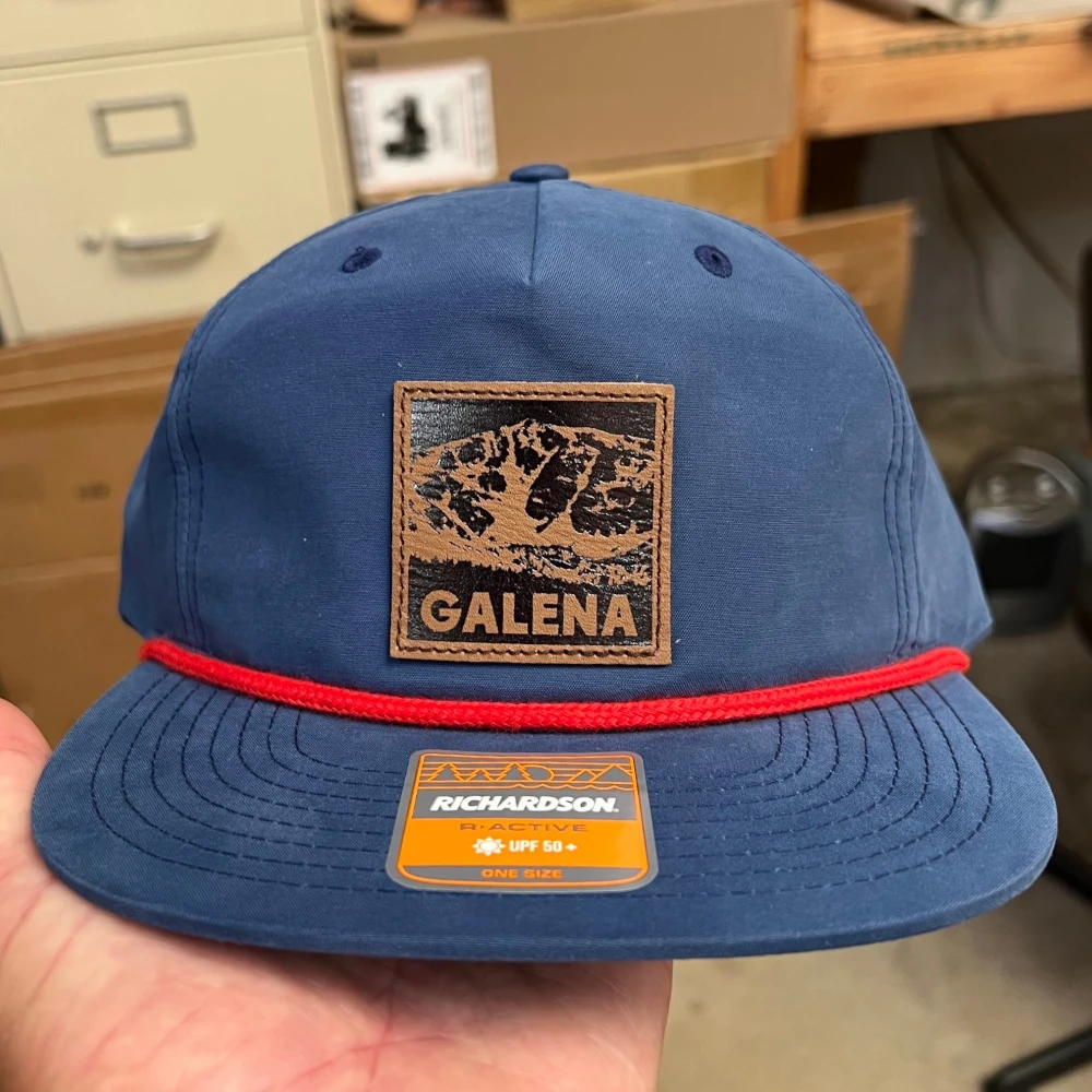 Navy Richardson 256 Umpqua rope cap with leather patch and red rope