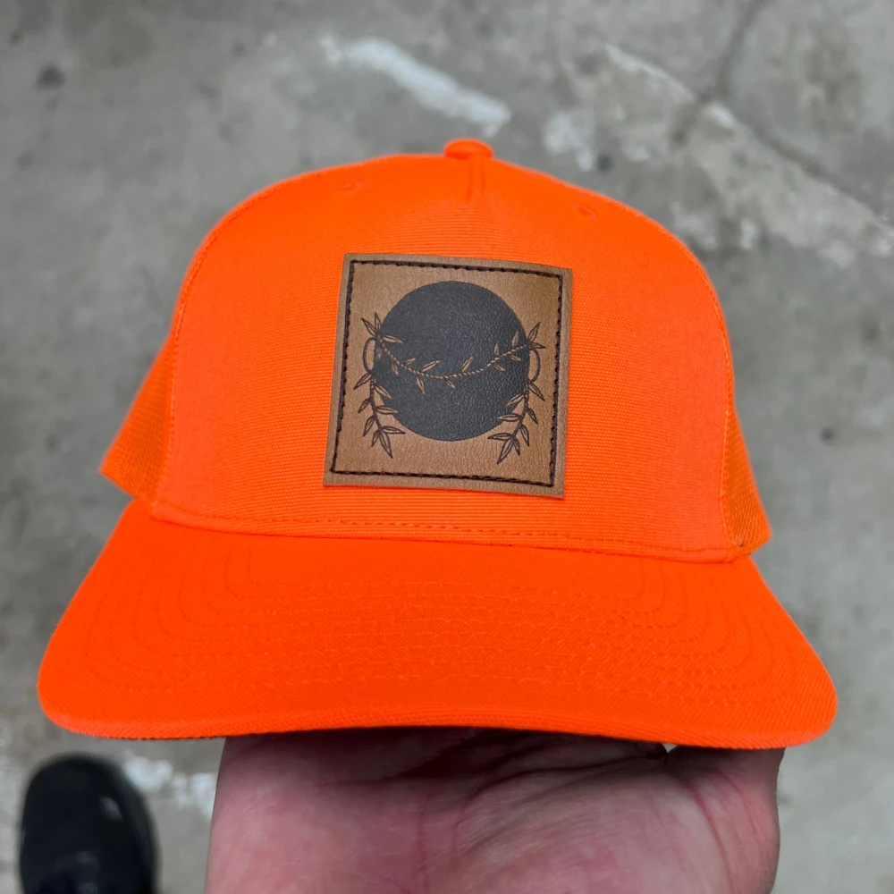 Blaze orange Richardson hat with square leather sewn patch