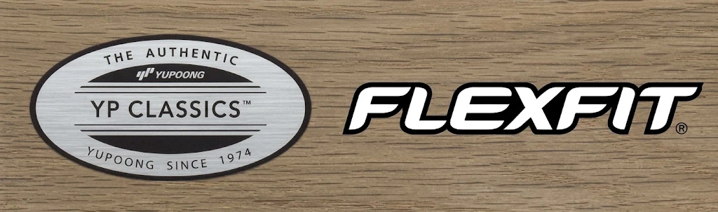 Yupoong YP Classics logo and Flexfit logo side by side on a wood background