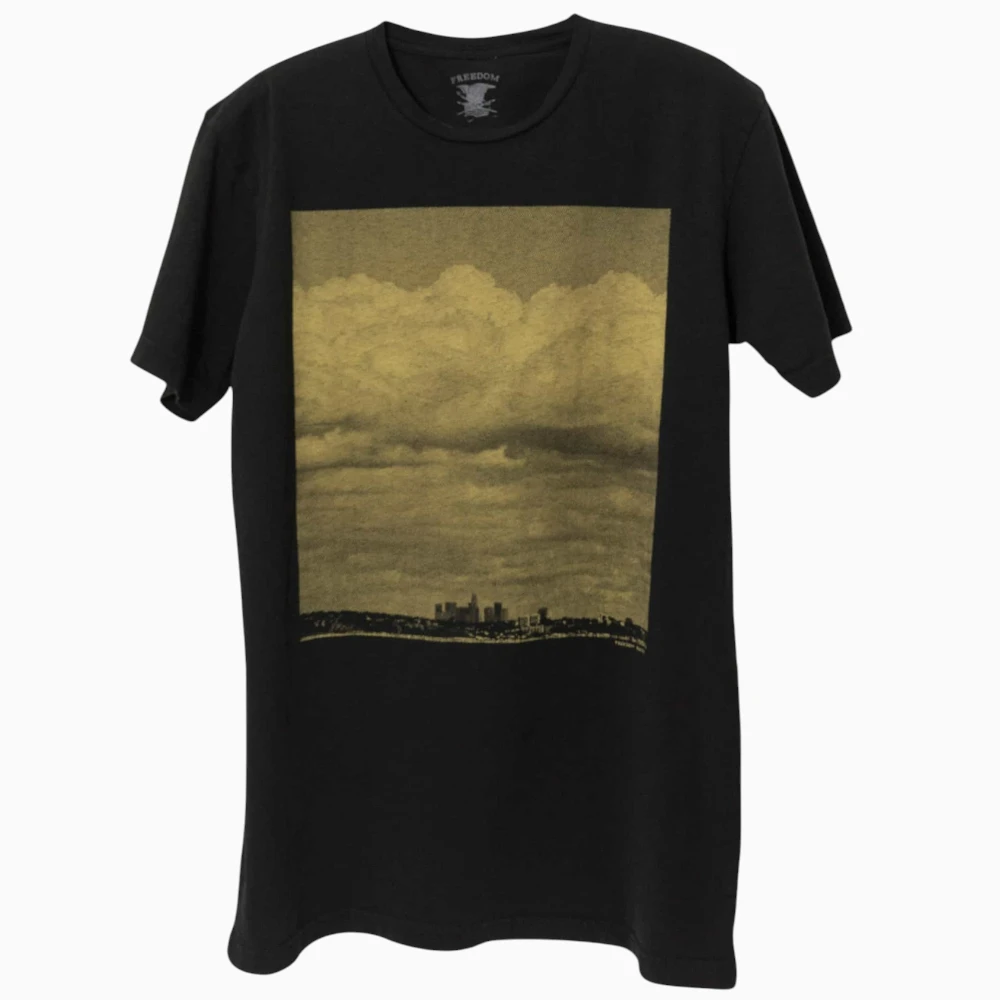 Gold ink skyline photo printed on a black t-shirt
