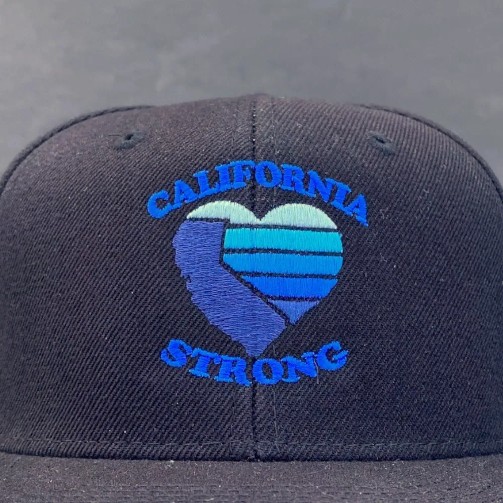 Multicolor embroidered heart and California design on a black snapback