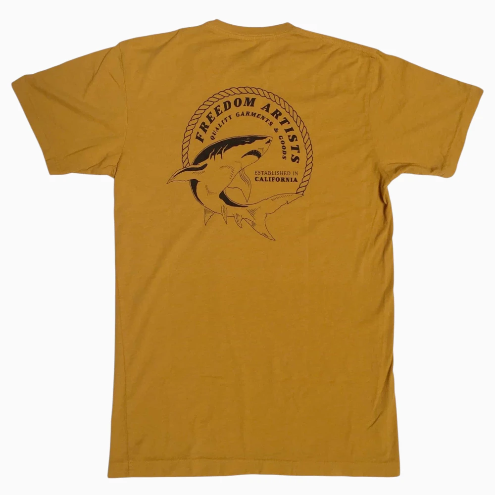 One-color shark crest screen printed on a mustard t-shirt
