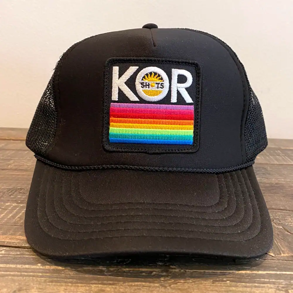 Black Otto Cap 39-165 foam front trucker hat with square embroidered patch