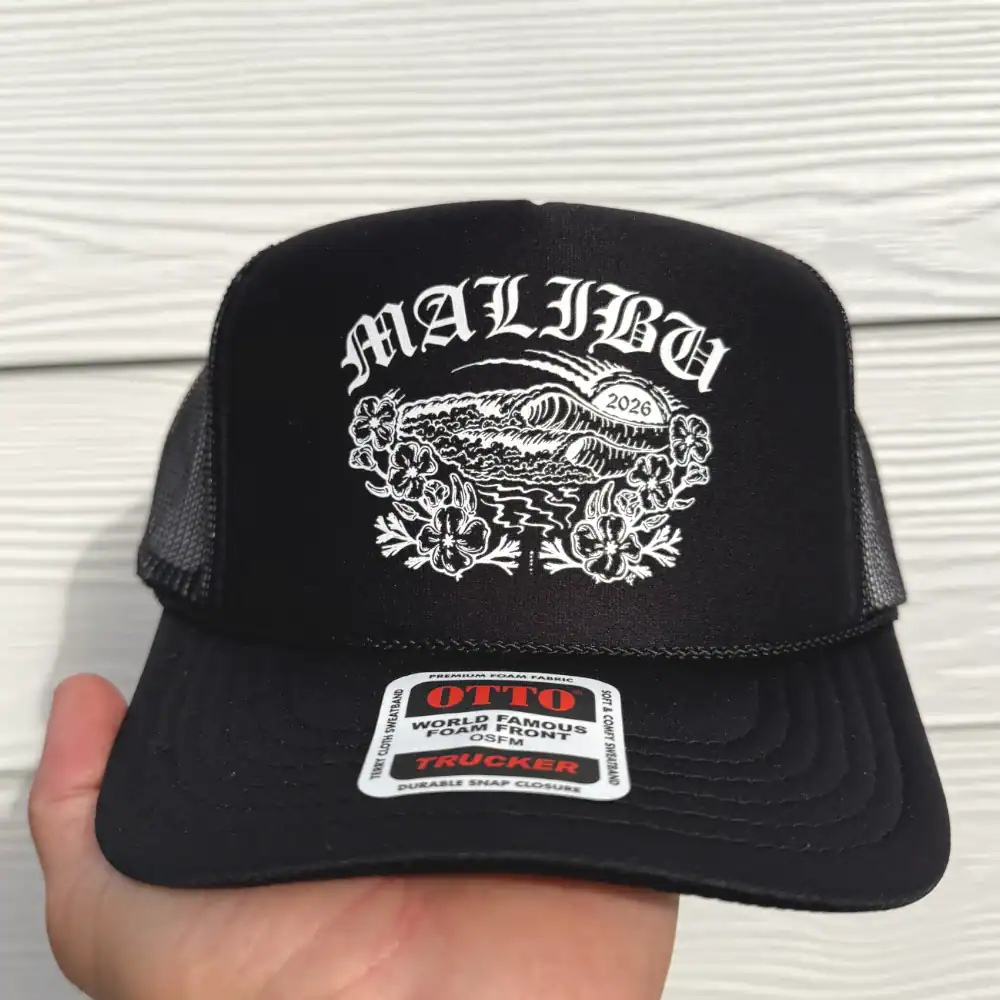 Black Otto Cap 39-165 foam front trucker hat with white printed wave and flower design