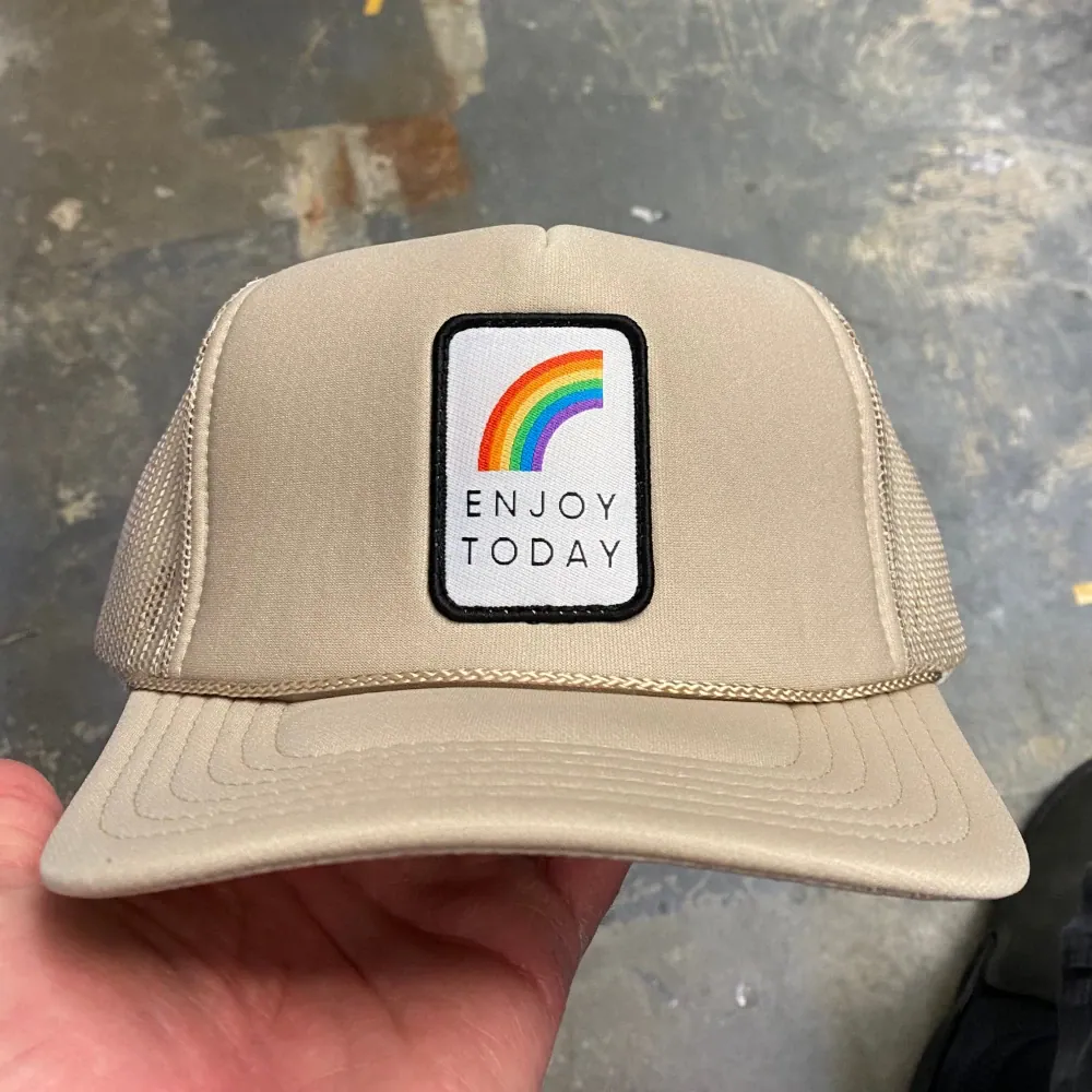 Khaki Otto Cap 39-165 foam front trucker hat with rainbow woven patch