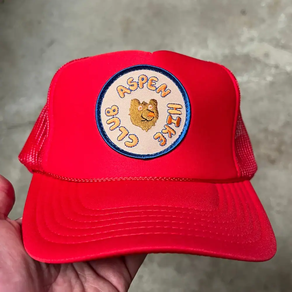 Red Otto Cap 39-165 foam front trucker hat with round embroidered patch