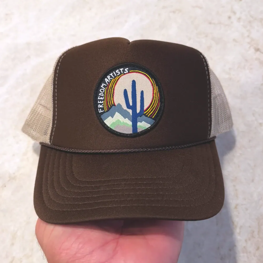 Brown and khaki Otto Cap foam front trucker hat with round woven patch