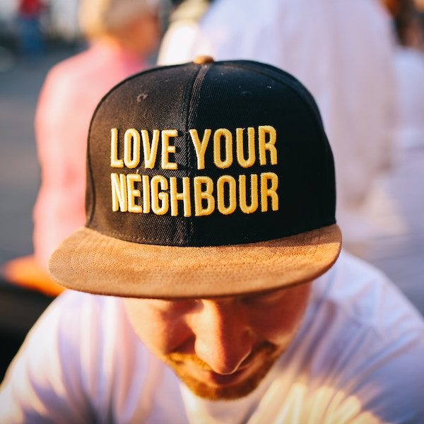 snapback hat with love your neighbor in 3d embroidery