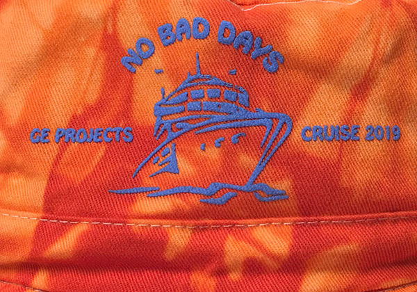 screenprint with puff ink on tie dye fisherman headwear