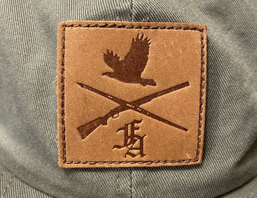 close up of leather patch on hat